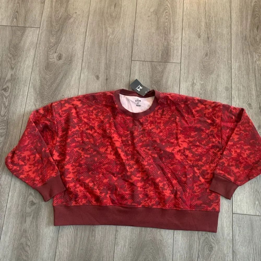 Under Armour woman’s rival fleece camo crew